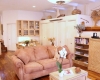 Casa Camilla Aspen Tropical Apartment living room couch
