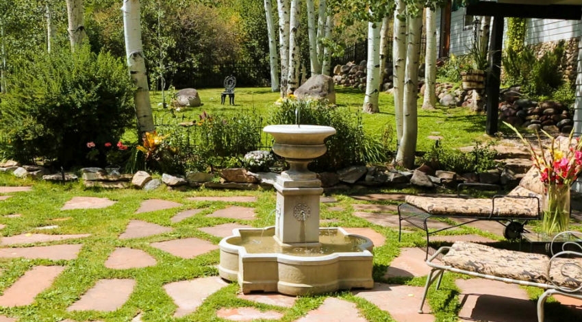 Casa Camilla Aspen Main House exterior fountain